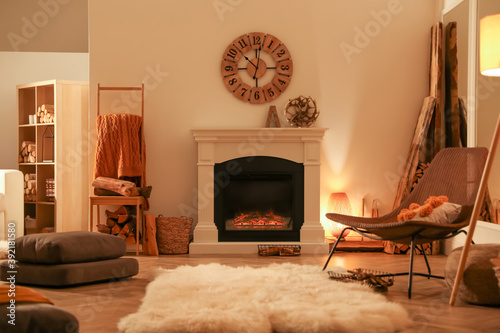 Beautiful view of cozy living room interior with fireplace photo