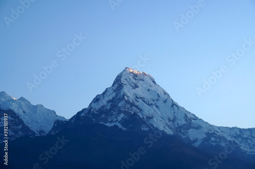 Annapurna mountain on himalaya rang mountain in the morning seen from Poon Hill, Nepal - Blue Nature view - Travel Trekking Concept