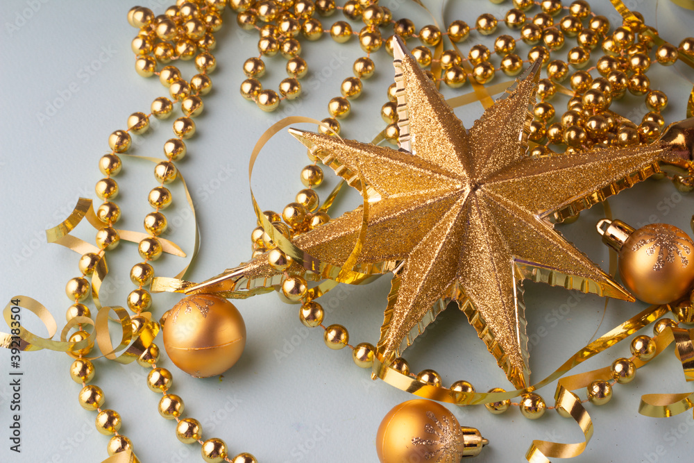 golden christmas star and ornaments. golden christmas star and ornaments.