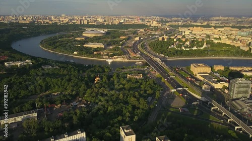 sunny evening moscow famous luzhniki stadium dustrict river aerial flight over panorama 4k russia