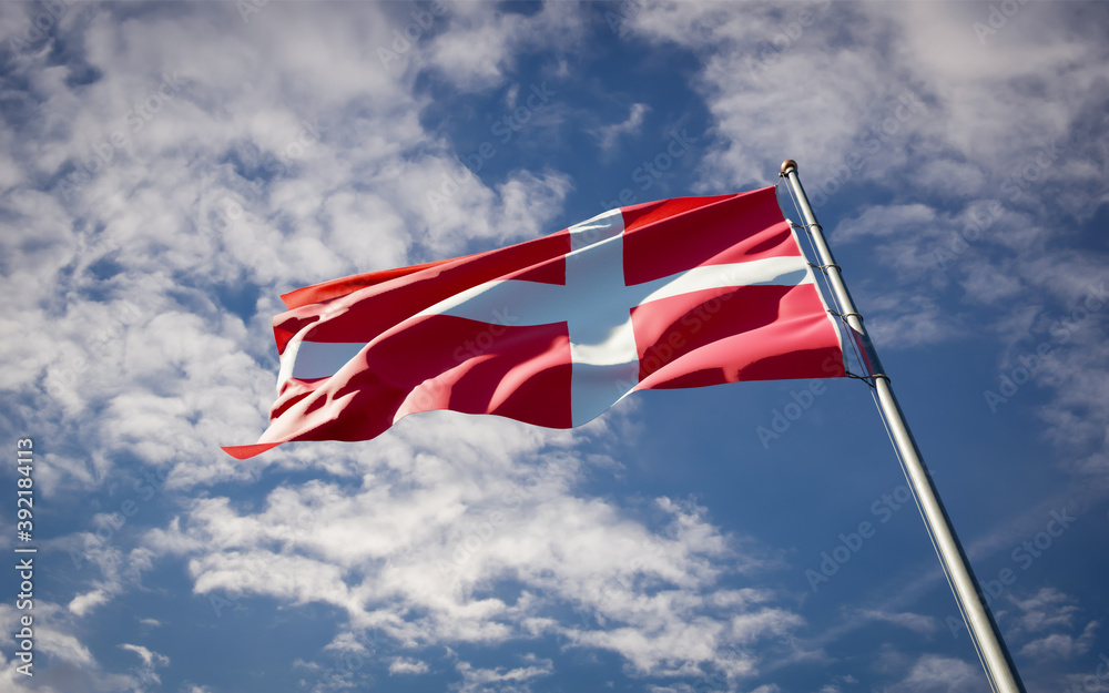 Beautiful national state flag of Denmark fluttering at sky background. Low angle close-up Denmark flag 3D artwork.