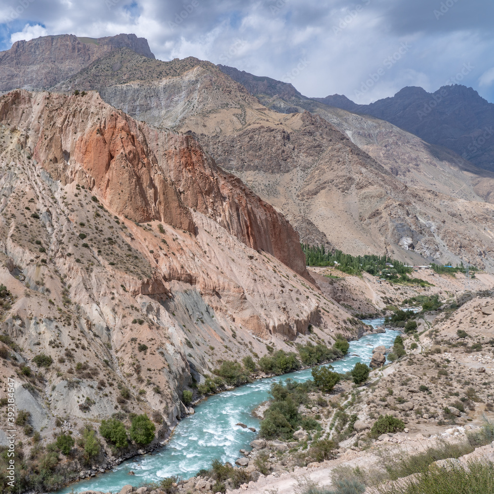 Colorful landscape view of Iskander darya river valley in the Fann mountains of Tajikistan leading to Iskanderkul lake
