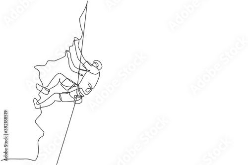 Single continuous line drawing of young muscular rockclimber man climbing hanging on mountain grip. Outdoor active lifestyle and rock climbing concept. Trendy one line draw design vector illustration