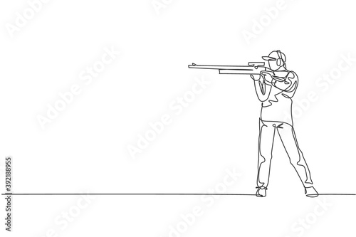 One continuous line drawing young man on shooting training ground practice for competition with rifle gun. Outdoor shooting sport concept. Dynamic single line draw graphic design vector illustration