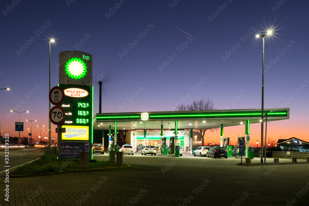 BP (British Petroleum) gas station and store with colorful evening sky in  the background Stock Photo | Adobe Stock