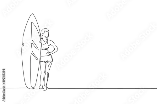 One single line drawing young sporty surfer woman with bikini standing and holding long surf board in beach vector graphic illustration. Extreme water sport concept. Modern continuous line draw design