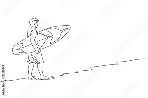 One continuous line drawing of young happy tourist surfer walking on sandy beach and carrying surfboard. Extreme watersport concept. Summer holiday. Dynamic single line draw design vector illustration
