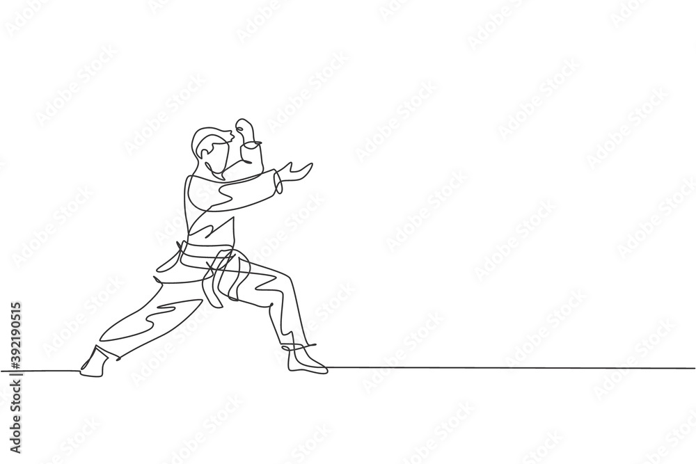 One continuous line drawing of young talented karateka man train pose for duel fighting at dojo gym center. Mastering martial art sport concept. Dynamic single line draw design vector illustration