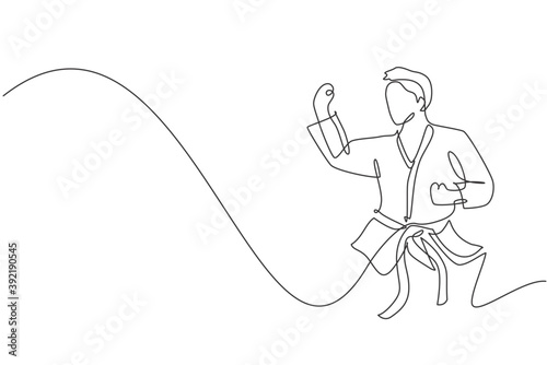 One single line drawing of young sporty karateka man in fight uniform with belt exercising martial art at gym vector illustration. Healthy sport lifestyle concept. Modern continuous line draw design
