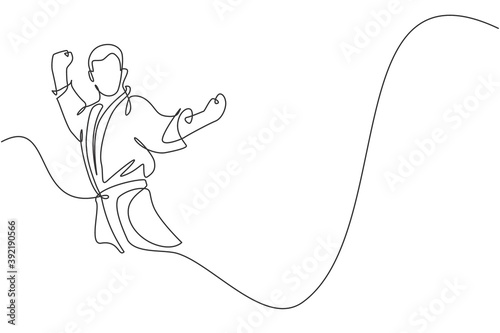 One single line drawing of young sporty karateka man in fight uniform with belt exercising martial art at gym vector illustration. Healthy sport lifestyle concept. Modern continuous line draw design