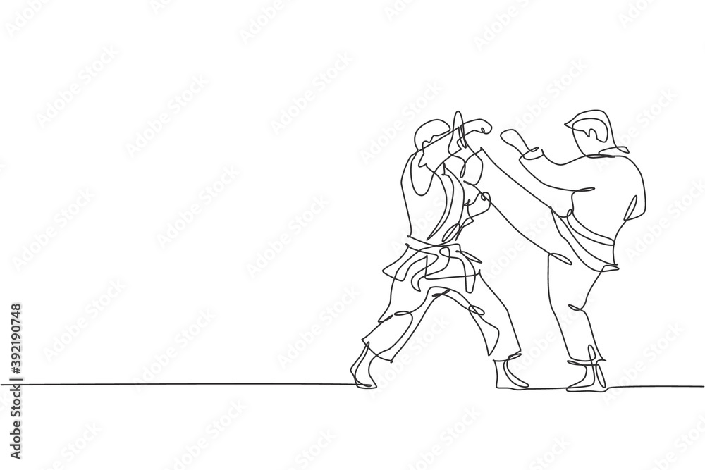One single line drawing of two young sporty karateka men in fight uniform with belt exercising martial art at gym vector illustration. Healthy sport lifestyle concept. Modern continue line draw design