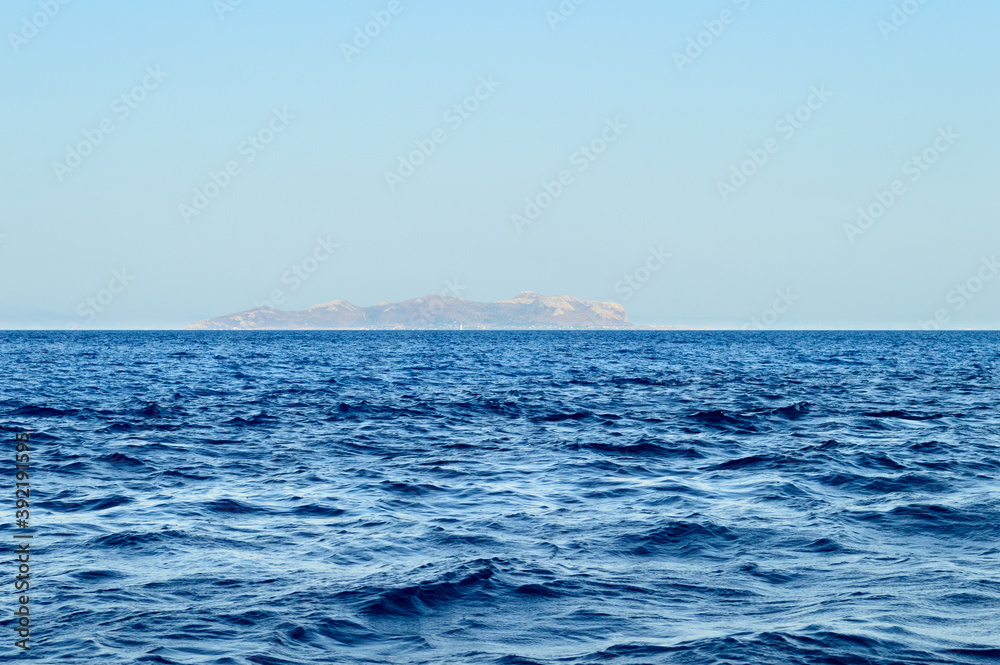 Seascape in Egadi Archipelago, Favignana and Levanzo visible on the Horizon line