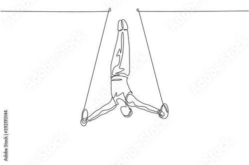 One continuous line drawing of young man exercising steady rings at gymnastic. Gymnast athlete in leotard. Healthy sport and active concept. Dynamic single line draw design vector illustration graphic