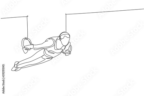 One single line drawing of young handsome gymnast man exercising steady rings graphic vector illustration. Healthy lifestyle and athletic sport concept. Modern continuous line draw design