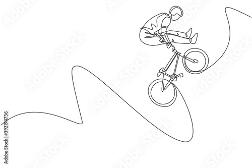 One continuous line drawing of young BMX bicycle rider does jumping into the air trick at skatepark. Extreme sport concept vector illustration. Single line draw design for event promotion art poster