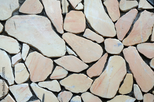 Surface stone arrang on the wall texture background
