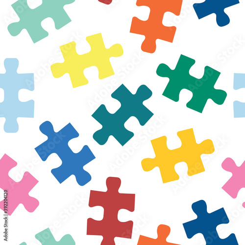 Puzzle pieces seamless vector pattern. Repeating background for fabric, kids wear, childrens decor. © StockArtRoom