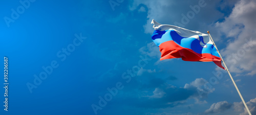 Beautiful national state flag of Slovenia with blank space. Slovenia flag on wide background with place for text 3D artwork.