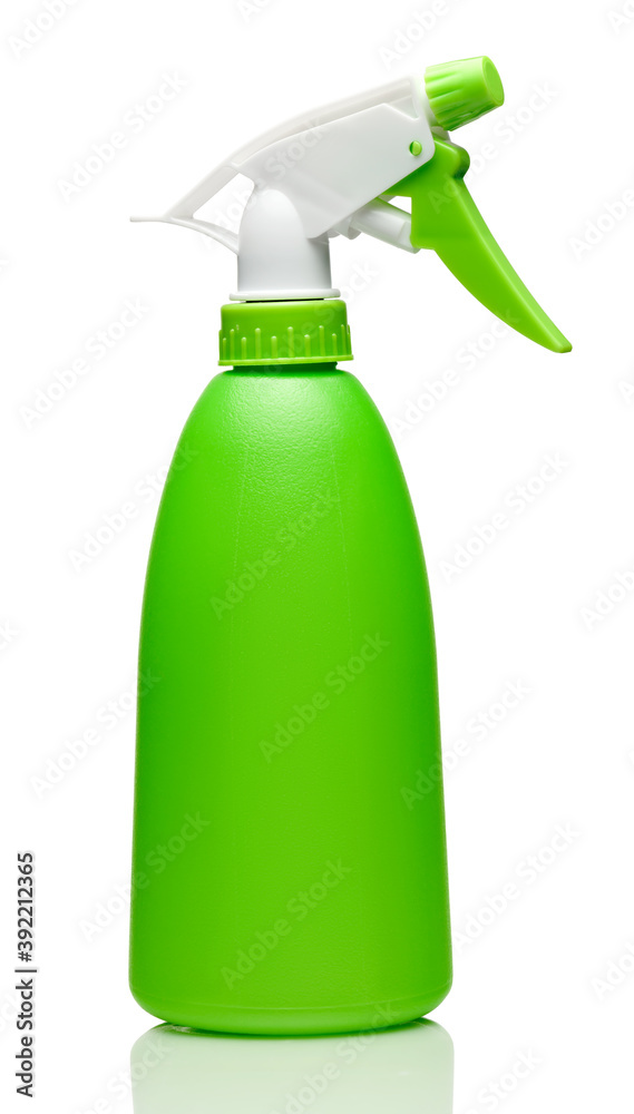 Spray bottle in green color, moisture sprayer, closeup photo of one object, isolated on white background Spray bottle in green color, moisture sprayer, closeup photo of one object, isolated on white background