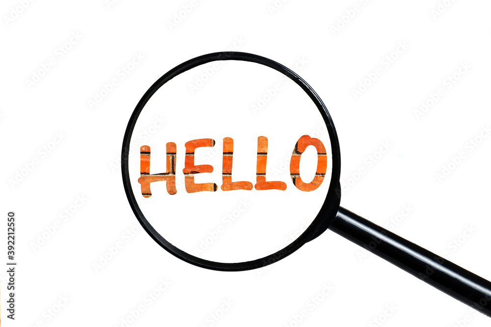 word hello and magnifying glass on white background. text on brick wall word hello and magnifying glass on white background. text on brick wall