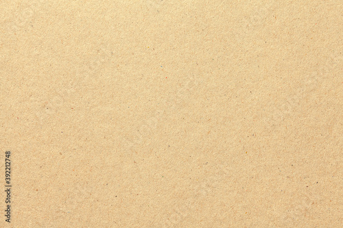 Texture of beige old paper, crumpled background.