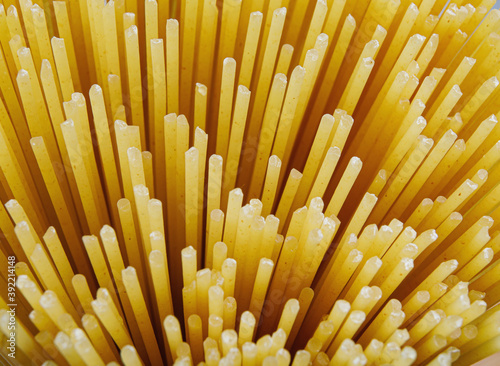 The bundle of spaghetti is photographed from the end. background from spaghetti.