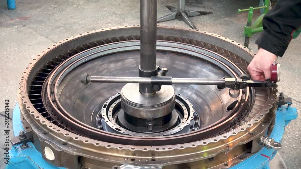 Dial indicator. Runout measurement on flange of turbine housing. Check