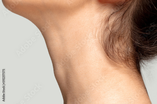 Neck. Close up portrait of beautiful jewish female model. Parts of face and body. Beauty, fashion, skincare, cosmetics, wellness concept. Copyspace. Well-kept skin, fresh look, details.
