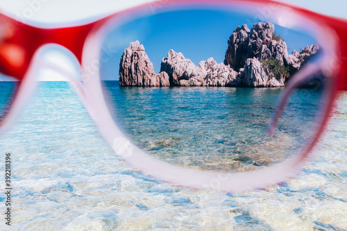 Bild auf Leinwand looking through glasses sky, sea and rock