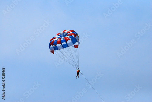 Sport Activity on the sea - parasailing over the blue sea in an bang beach hoian vietnam