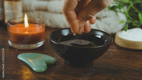 Table with essential oil. Spa and massage concept.