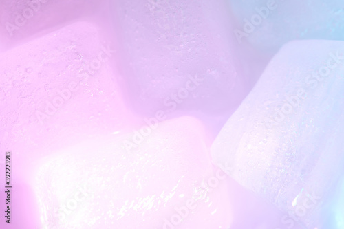 Pink color illuminated ice background
