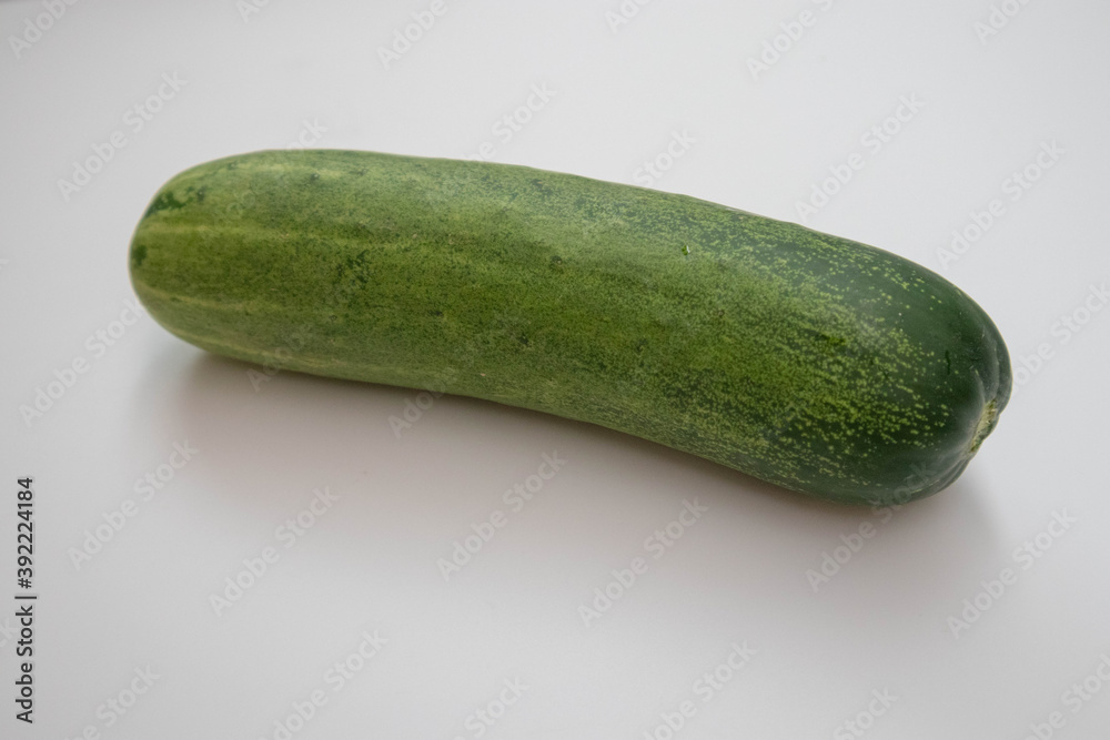 One fresh raw cucumber isolated One fresh raw cucumber isolated
