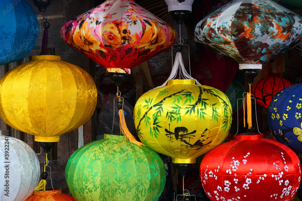 Many Colorful Vietnam lantern hanging on the wall at hoi an ancient old town is UNESCO World Heritage Sites in Hoi An , Vietnam - Texture Background  
