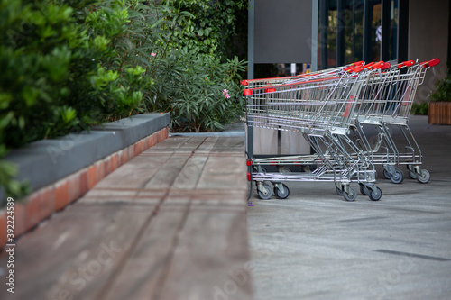 The cart was placed outside the building.	