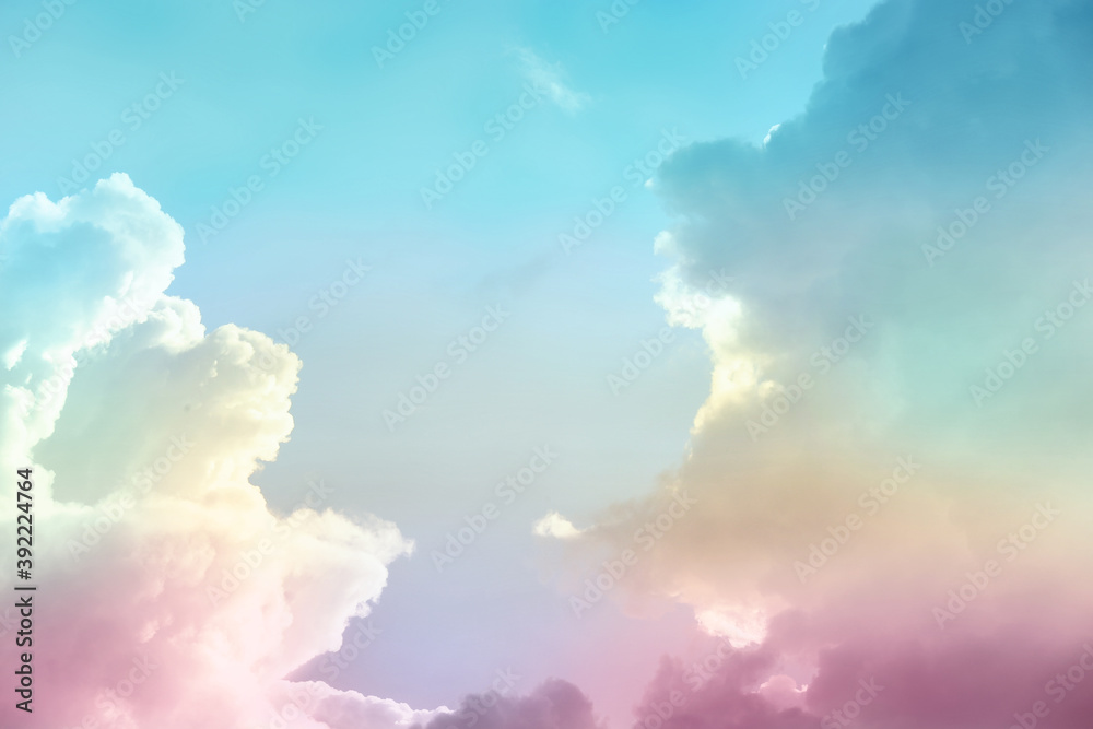 Fantasy world. Picturesque view of beautiful magic sky with fluffy clouds, toned in pastel rainbow or unicorn colors