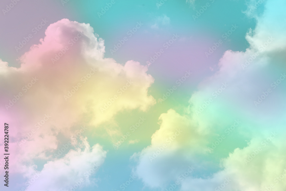Fantasy world. Picturesque view of beautiful magic sky with fluffy clouds, toned in pastel rainbow or unicorn colors
