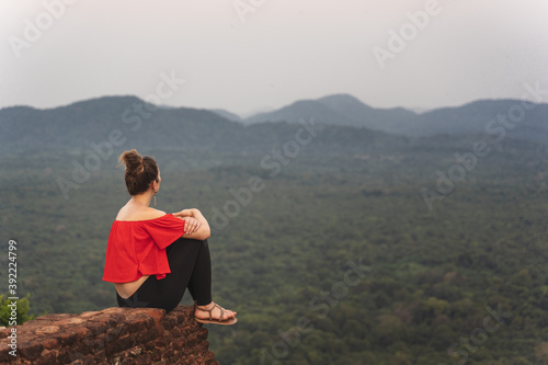 young adult observe panorama from lion rock in Sri Lanka