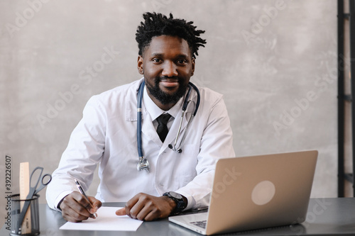 Black doctor. Telemedicine the use of computer and telecommunications technologies for the exchange of medical information