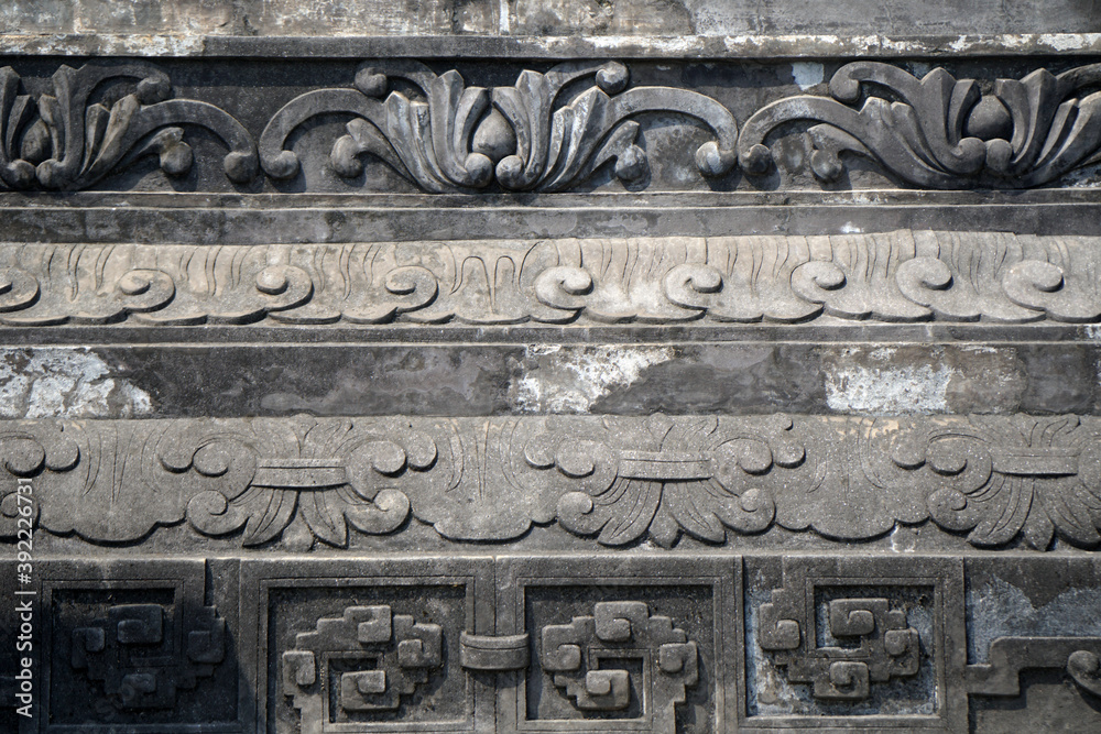 Surface Ancient Sculpture Black wall of Royal Tomb of Khai Dinh King architecture of the city of Hue Vietnam   