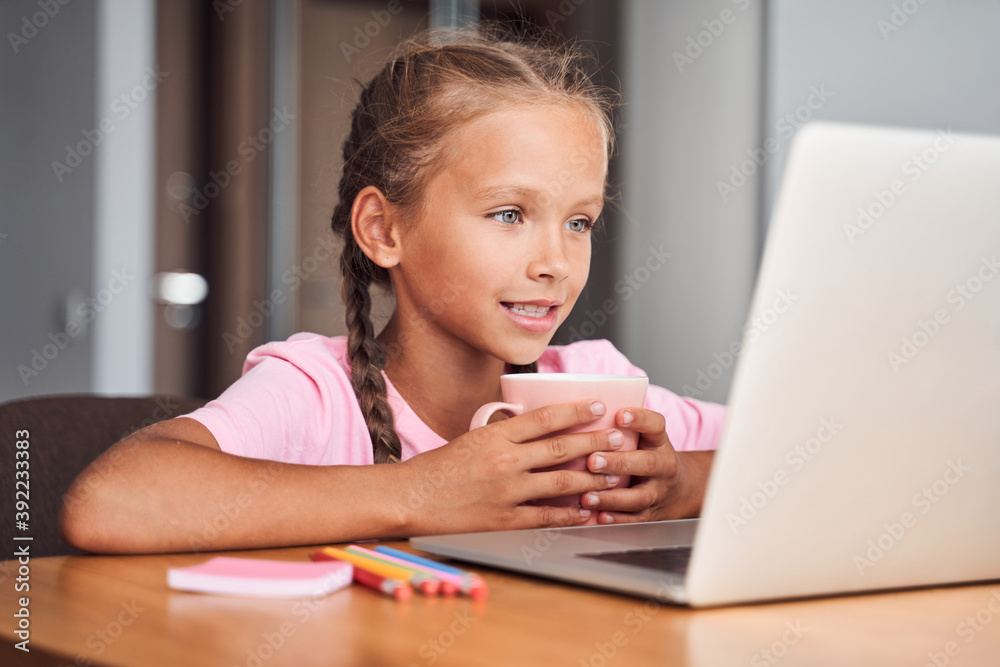 Girl having video call distant Girl having video call distant