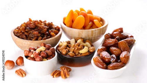 nuts and dried fruit on white background