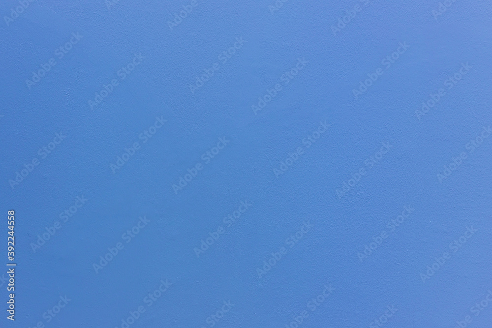 Blue sheet of cardboard paper with rough surface texture background. Textures on the blue wall use for background. Empty interior with blue wall or a blue floor. Blue sheet of cardboard paper with rough surface texture background. Textures on the blue wall use for background. Empty interior with blue wall or a blue floor.
