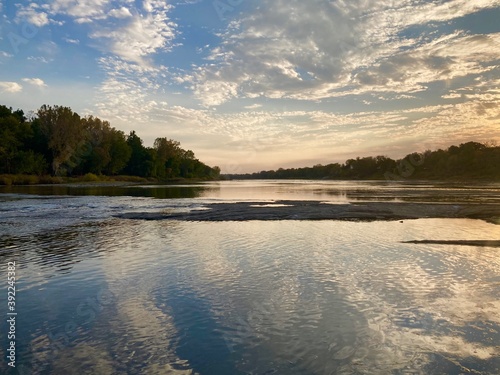 Valokuva sunset on the river