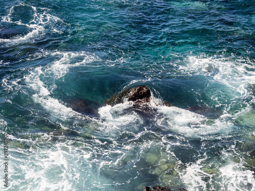 Whirlpool caused by the very rocky coastline at La caleta, Teneriffe, Spain