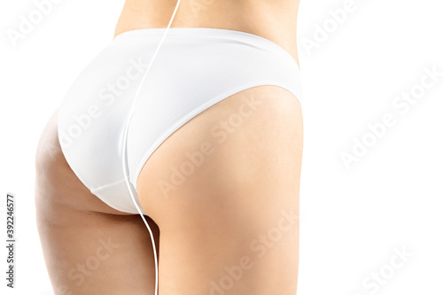 Overweight woman with cellulite legs and buttocks in white underwear comparing with fit and thin body isolated on white background. Orange peel skin, liposuction, healthcare, beauty, sport, surgery.
