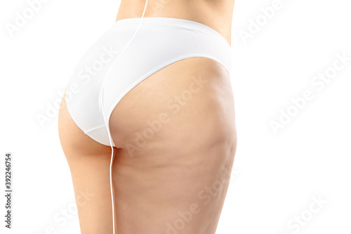 Overweight woman with cellulite legs and buttocks in white underwear comparing with fit and thin body isolated on white background. Orange peel skin, liposuction, healthcare, beauty, sport, surgery.