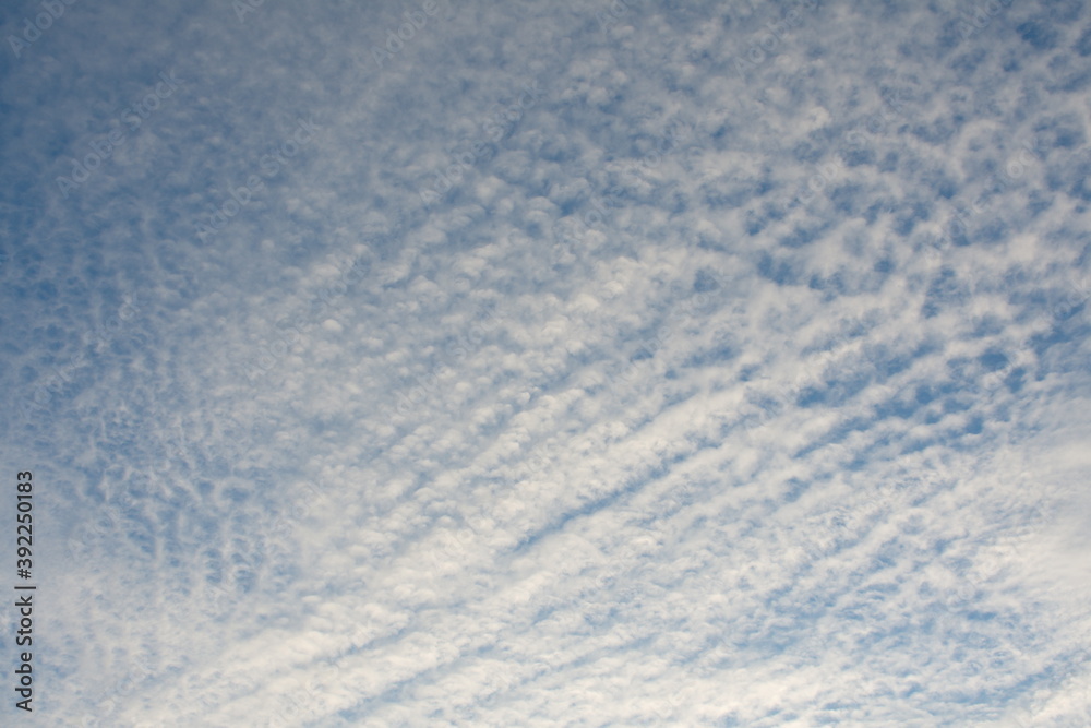 white fluffy clouds in the blue sky white fluffy clouds in the blue sky