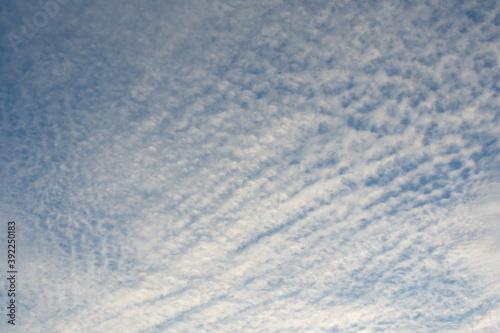 white fluffy clouds in the blue sky © Monrudee