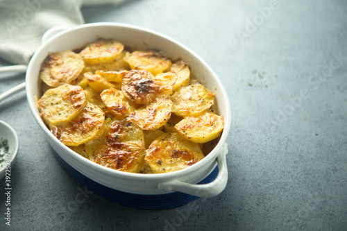 Traditional homemade potato gratin with cheese